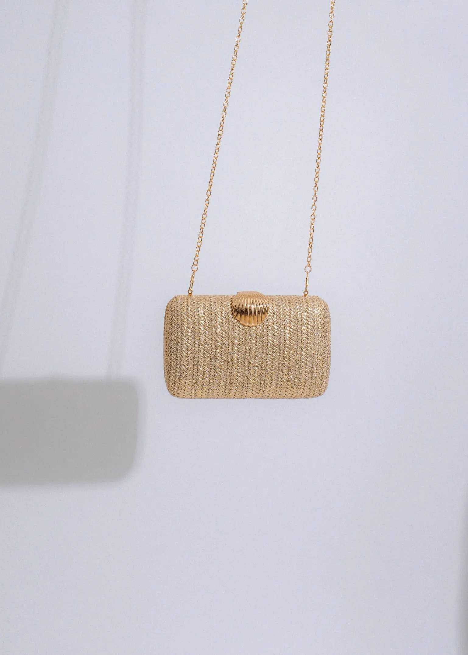 Seashell Weave Clutches Gold